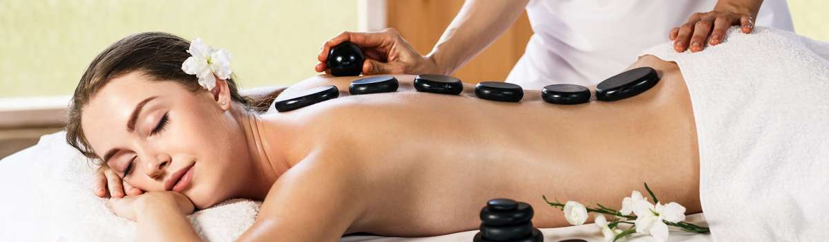 Mασάζ με θερμές πέτρες Mασάζ με θερμές πέτρες